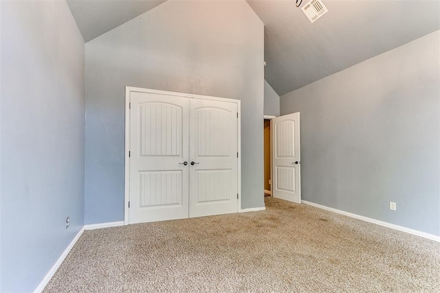 3393 Creek View Ct, Newcastle, OK 73065 - unfurnished bedroom with lofted ceiling, carpet floors, a closet, and baseboards