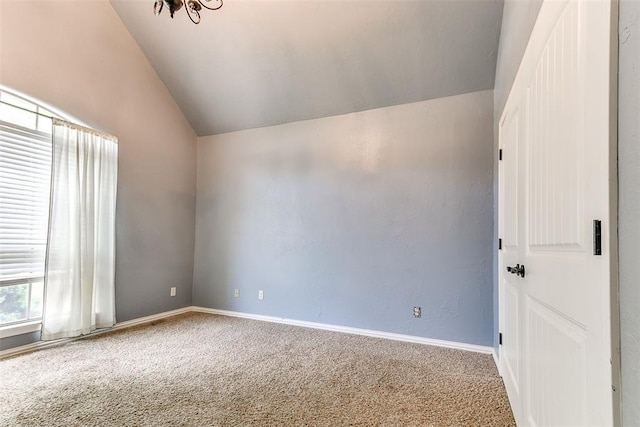 3393 Creek View Ct, Newcastle, OK 73065 - empty room with lofted ceiling, carpet flooring, and baseboards