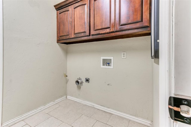 3393 Creek View Ct, Newcastle, OK 73065 - laundry area with washer hookup, baseboards, light tile patterned flooring, and cabinet space