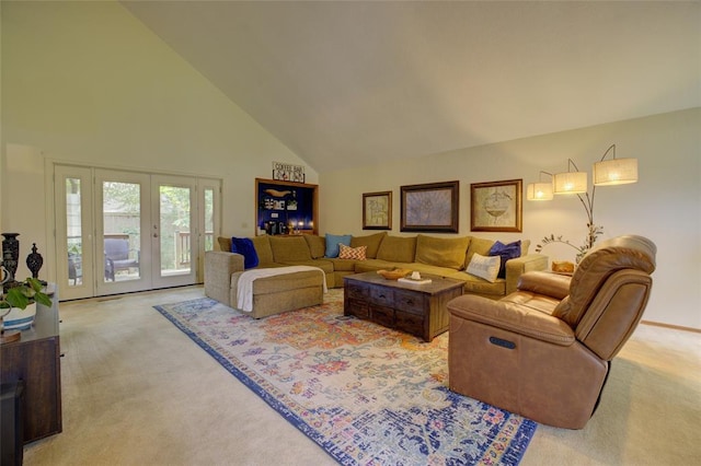 2010 Trailview Ct, Norman, OK 73072 - living area with light colored carpet, high vaulted ceiling, and french doors