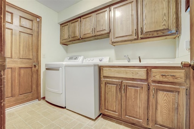 2010 Trailview Ct, Norman, OK 73072 - laundry area featuring separate washer and dryer and cabinet space