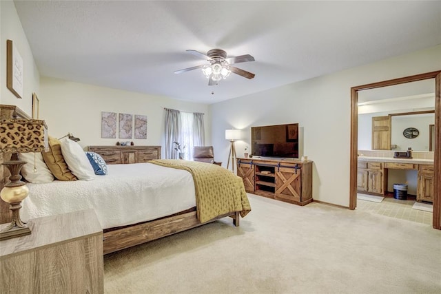 2010 Trailview Ct, Norman, OK 73072 - bedroom with light carpet, connected bathroom, ceiling fan, and baseboards
