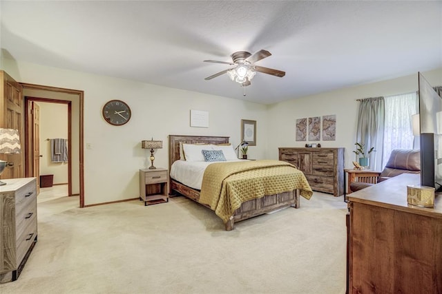 2010 Trailview Ct, Norman, OK 73072 - bedroom with light carpet, a ceiling fan, and baseboards