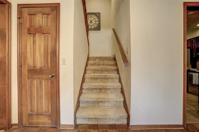2010 Trailview Ct, Norman, OK 73072 - stairway featuring baseboards