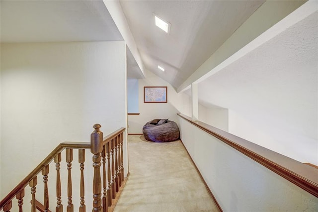 2010 Trailview Ct, Norman, OK 73072 - hallway with lofted ceiling, an upstairs landing, and light colored carpet