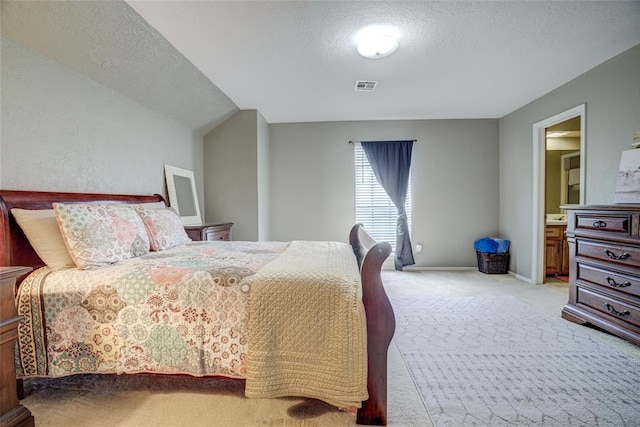 2010 Trailview Ct, Norman, OK 73072 - bedroom with light carpet, a textured ceiling, and baseboards