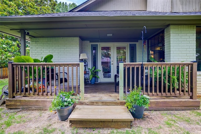 2010 Trailview Ct, Norman, OK 73072 - doorway to property featuring brick siding, french doors, and a porch