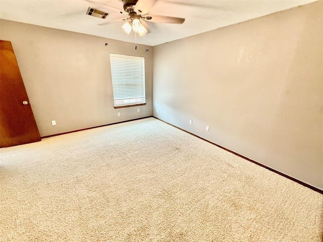 4400 Hemingway Dr Unit 263, Oklahoma City, OK 73118 - carpeted spare room with ceiling fan and baseboards