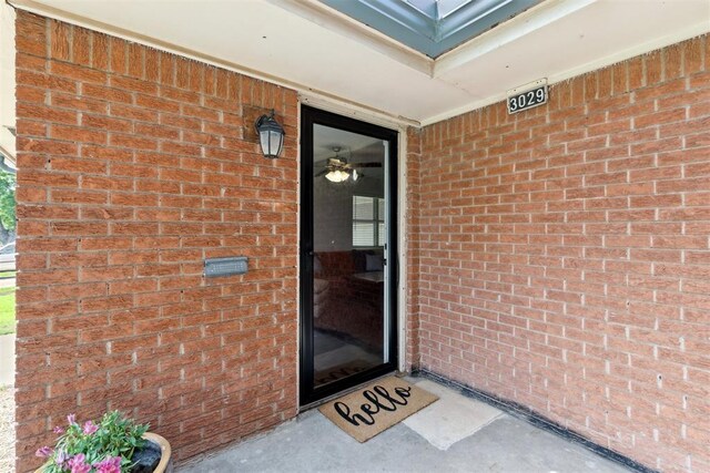 3029 NW 65th St, Oklahoma City, OK 73116 - entrance to property featuring brick siding
