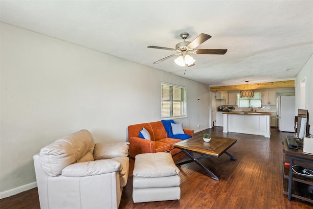 3029 NW 65th St, Oklahoma City, OK 73116 - living room with ceiling fan and dark wood-style flooring