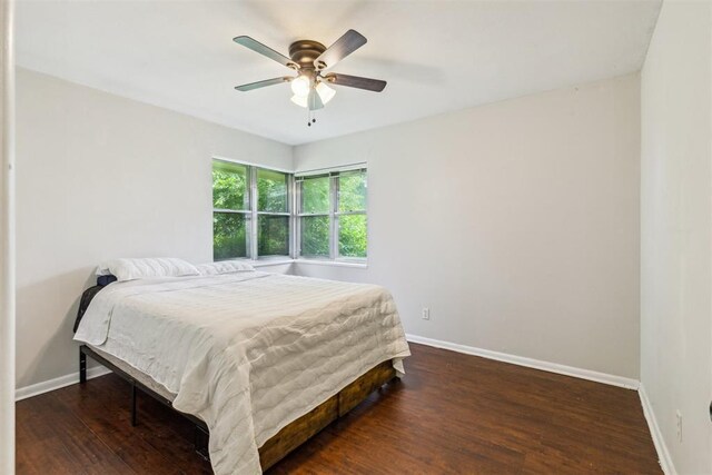 3029 NW 65th St, Oklahoma City, OK 73116 - bedroom with wood finished floors and ceiling fan
