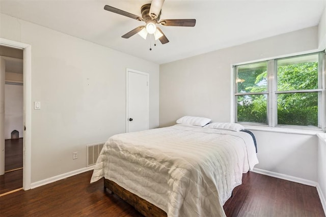 3029 NW 65th St, Oklahoma City, OK 73116 - bedroom with wood finished floors and a ceiling fan