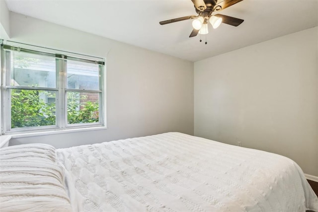 3029 NW 65th St, Oklahoma City, OK 73116 - bedroom with a ceiling fan and baseboards
