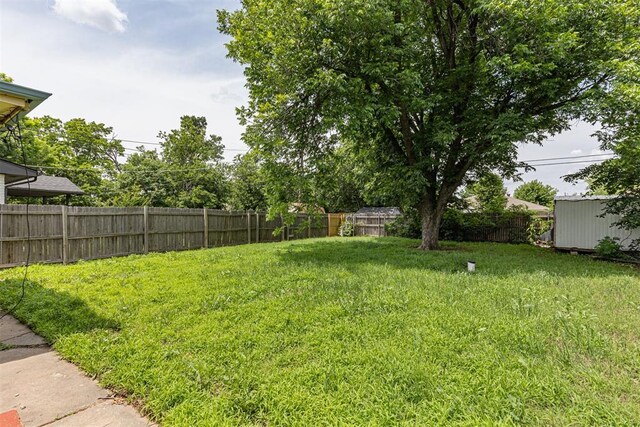 3029 NW 65th St, Oklahoma City, OK 73116 - fenced backyard with a shed