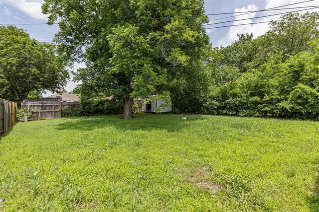 3029 NW 65th St, Oklahoma City, OK 73116 - view of yard with a storage shed