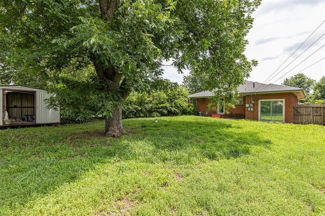 3029 NW 65th St, Oklahoma City, OK 73116 - view of yard with a storage shed