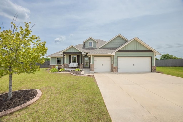 10800 NW 5th St, Yukon, OK 73099 - craftsman house with a garage, driveway, brick siding, a porch, and a shingled roof