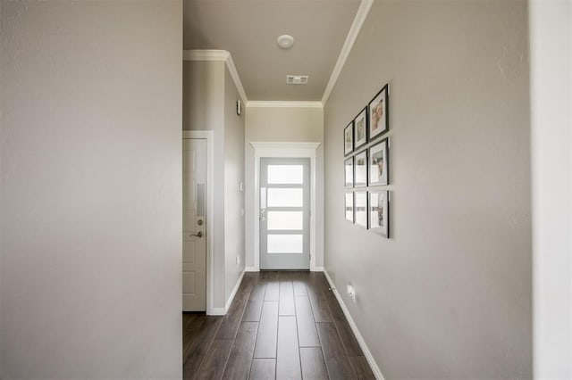 10800 NW 5th St, Yukon, OK 73099 - entryway with crown molding and dark wood finished floors