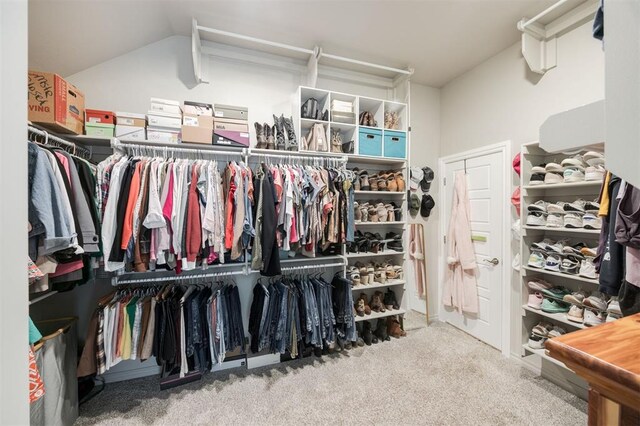 10800 NW 5th St, Yukon, OK 73099 - walk in closet with carpet and vaulted ceiling