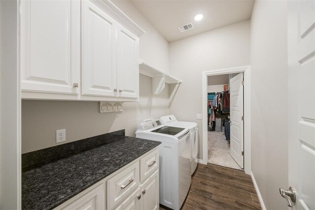 10800 NW 5th St, Yukon, OK 73099 - washroom with independent washer and dryer, cabinet space, dark wood-style flooring, and recessed lighting