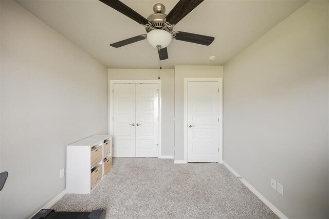 10800 NW 5th St, Yukon, OK 73099 - unfurnished bedroom featuring carpet floors, a closet, and ceiling fan