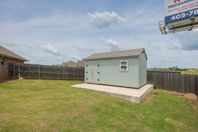 10800 NW 5th St, Yukon, OK 73099 - view of shed featuring a fenced backyard
