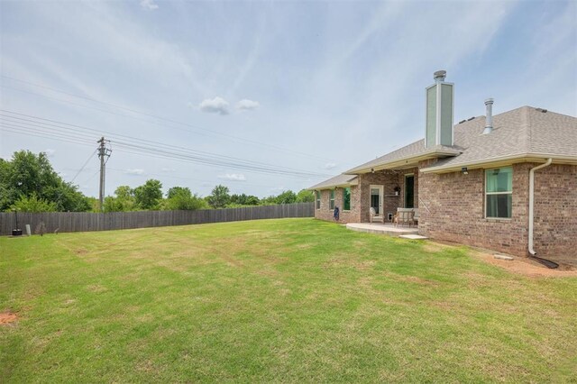 10800 NW 5th St, Yukon, OK 73099 - view of yard with a patio area
