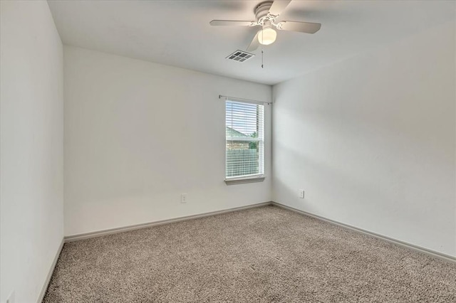 14500 Gravity Falls Ln, Oklahoma City, OK 73142 - carpeted spare room with baseboards and a ceiling fan