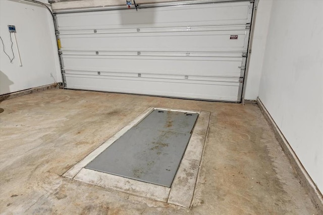 14500 Gravity Falls Ln, Oklahoma City, OK 73142 - garage featuring baseboards