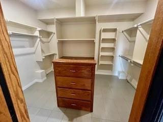 3805 Highridge, Edmond, OK 73003 - spacious closet with tile patterned flooring