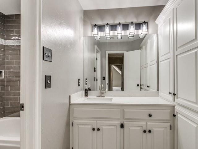 3805 Highridge, Edmond, OK 73003 - full bathroom featuring vanity and shower / bath combination