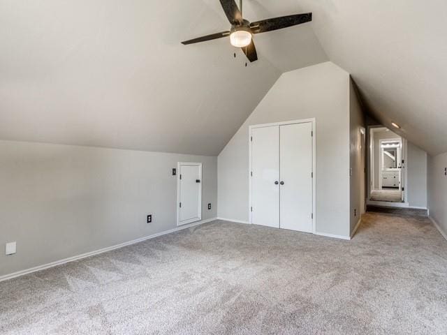3805 Highridge, Edmond, OK 73003 - bonus room featuring a ceiling fan, carpet, and lofted ceiling