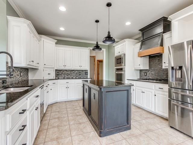 3805 Highridge, Edmond, OK 73003 - kitchen featuring appliances with stainless steel finishes, decorative backsplash, white cabinetry, ornamental molding, and recessed lighting