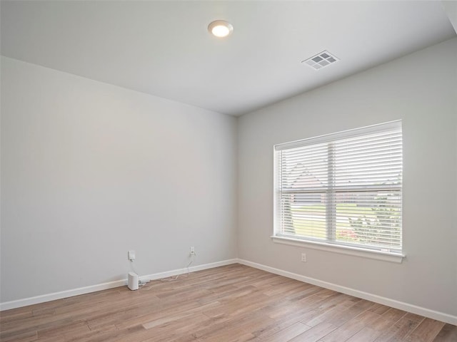 19608 Dalemead Way, Edmond, OK 73012 - unfurnished room featuring light wood-type flooring and baseboards