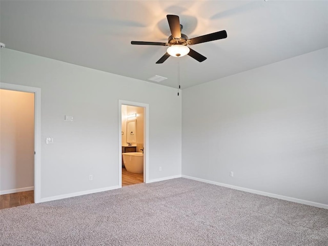 19608 Dalemead Way, Edmond, OK 73012 - unfurnished bedroom with carpet flooring, ensuite bath, and ceiling fan