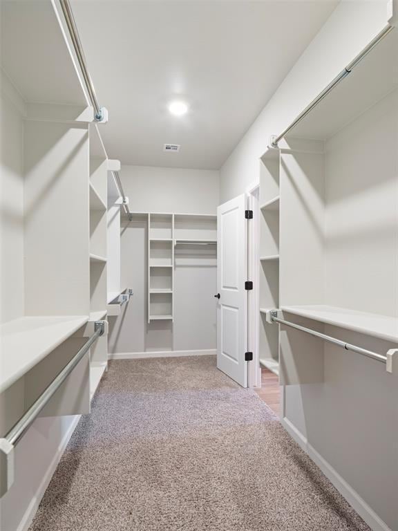 19608 Dalemead Way, Edmond, OK 73012 - walk in closet featuring carpet floors