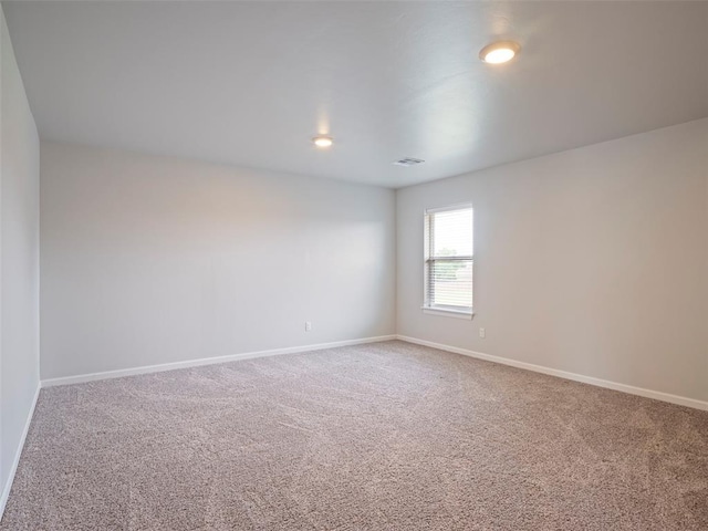 19608 Dalemead Way, Edmond, OK 73012 - carpeted empty room featuring baseboards