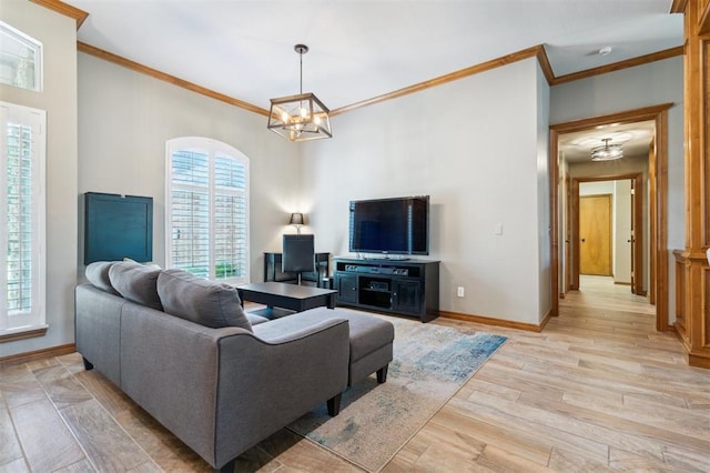 2917 Stafford Rd, Edmond, OK 73012 - living area featuring plenty of natural light, ornamental molding, a chandelier, and light wood-type flooring