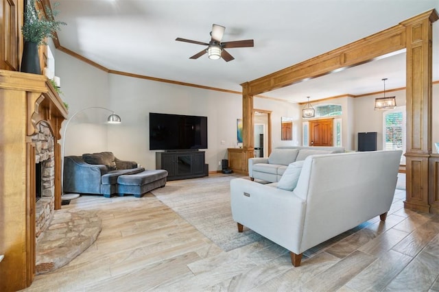2917 Stafford Rd, Edmond, OK 73012 - living area with a fireplace, crown molding, and ceiling fan