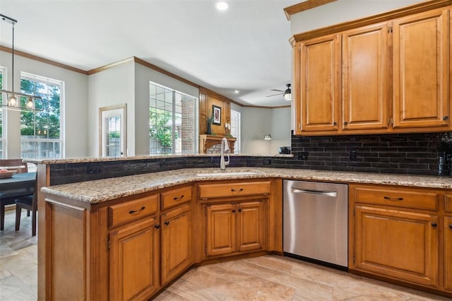 2917 Stafford Rd, Edmond, OK 73012 - kitchen with stainless steel dishwasher, crown molding, brown cabinets, light stone counters, and backsplash
