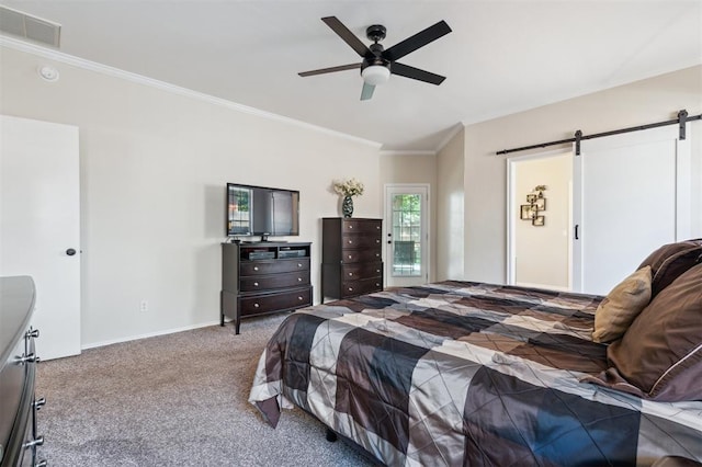 2917 Stafford Rd, Edmond, OK 73012 - bedroom featuring a barn door, crown molding, carpet flooring, and a ceiling fan