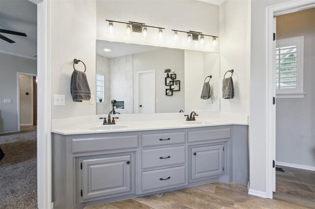 2917 Stafford Rd, Edmond, OK 73012 - bathroom with double vanity, healthy amount of natural light, and ceiling fan