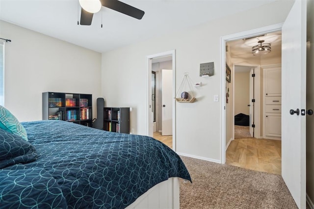 2917 Stafford Rd, Edmond, OK 73012 - carpeted bedroom featuring baseboards and a ceiling fan