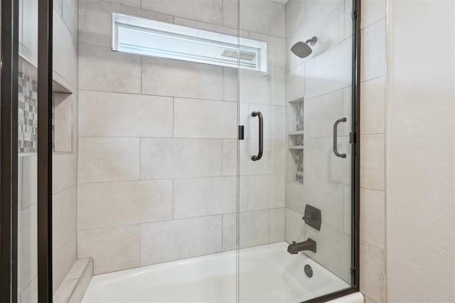 2917 Stafford Rd, Edmond, OK 73012 - bathroom with combined bath / shower with glass door and healthy amount of natural light