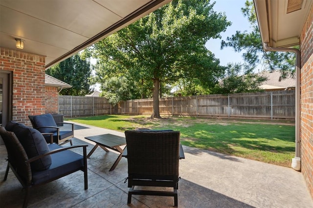 2917 Stafford Rd, Edmond, OK 73012 - fenced backyard featuring a patio area and an outdoor living space