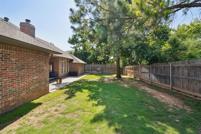 2917 Stafford Rd, Edmond, OK 73012 - fenced backyard featuring a patio area