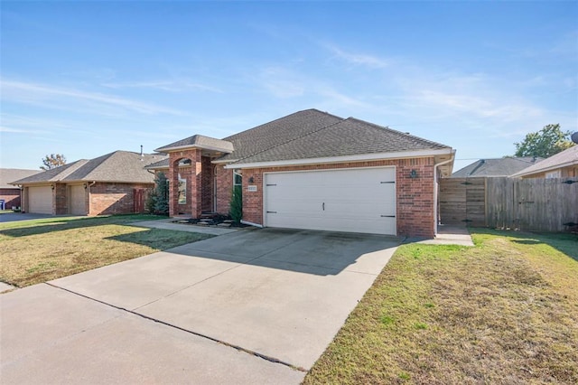 8300 NW 71st St, Oklahoma City, OK 73132 - view of front of home featuring brick siding, an attached garage, roof with shingles, and concrete driveway