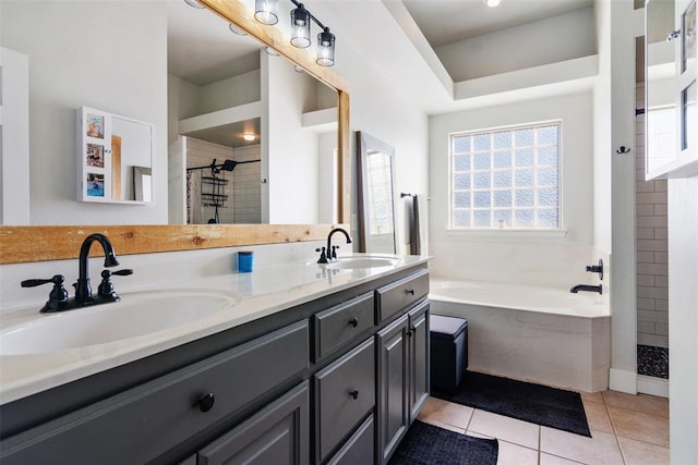 8300 NW 71st St, Oklahoma City, OK 73132 - full bathroom with a shower stall, a garden tub, double vanity, and tile patterned flooring