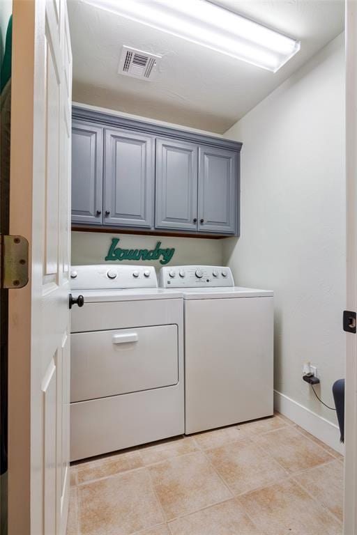 8300 NW 71st St, Oklahoma City, OK 73132 - washroom featuring cabinet space and washing machine and clothes dryer