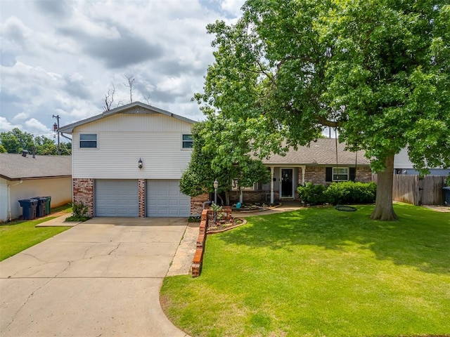 4808 NW 68th St, Oklahoma City, OK 73132 - view of front of property with brick siding, a garage, and driveway